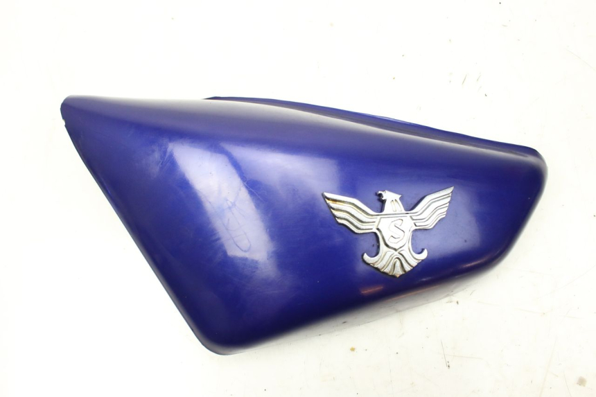 photo de CACHE SOUS SELLE GAUCHE SYM HUSKY 125 (1999 - 2005)