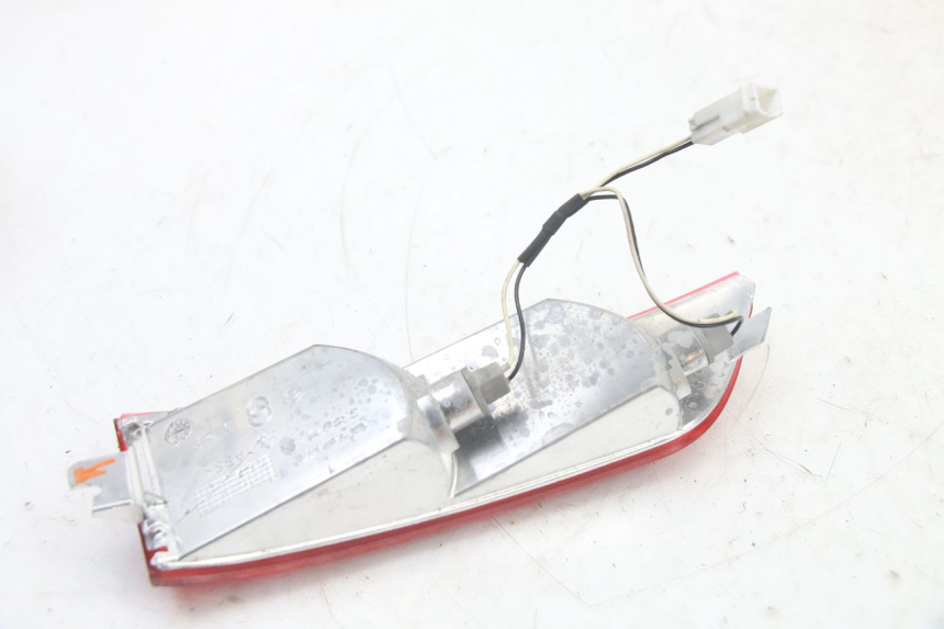 photo de CLIGNOTANT ARRIERE GAUCHE PIAGGIO XEVO - X EVO 125 (2007 - 2016) - État de surface