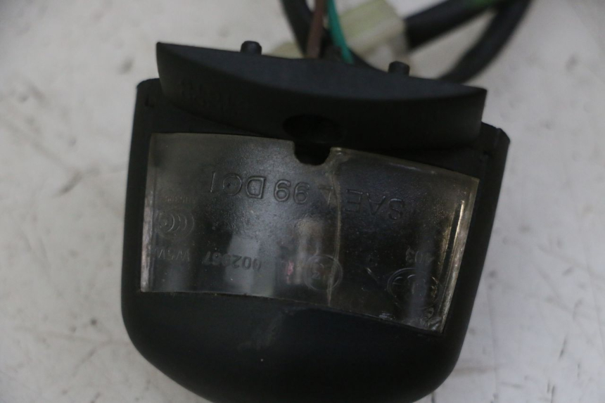 photo de ECLAIRAGE DE PLAQUE PEUGEOT CITYSTAR 50 (2013 - 2017) - Zoom état d’usage