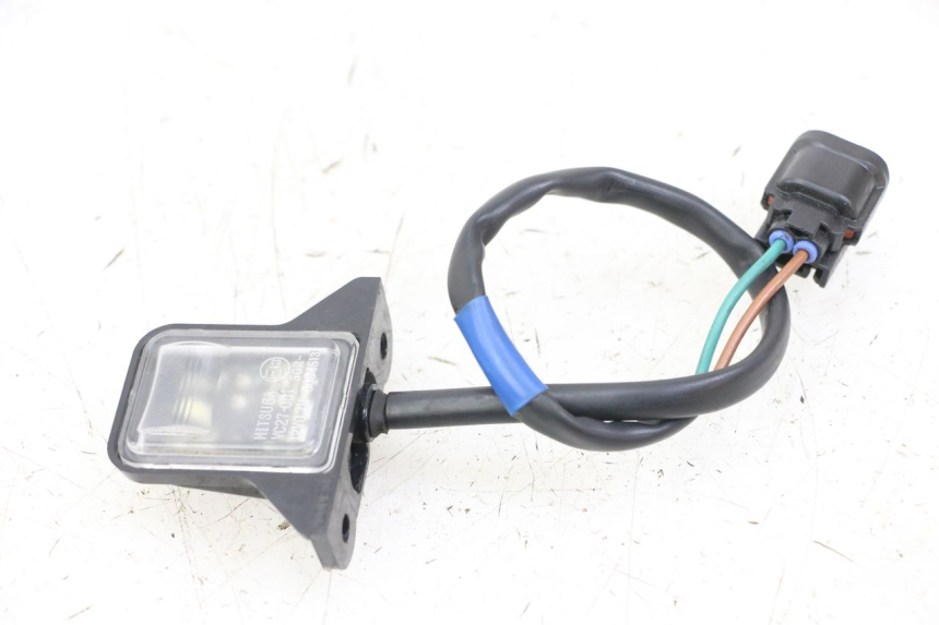 photo de ECLAIRAGE DE PLAQUE HONDA FORZA 125 (2021 - 2025) - Détail de la pièce