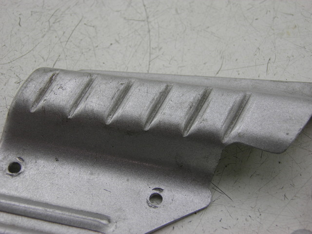 photo de PAIRE CALE PIED ARRIERE BAOTIAN TRAVEL SPIRIT 50 (2010 - 2012)