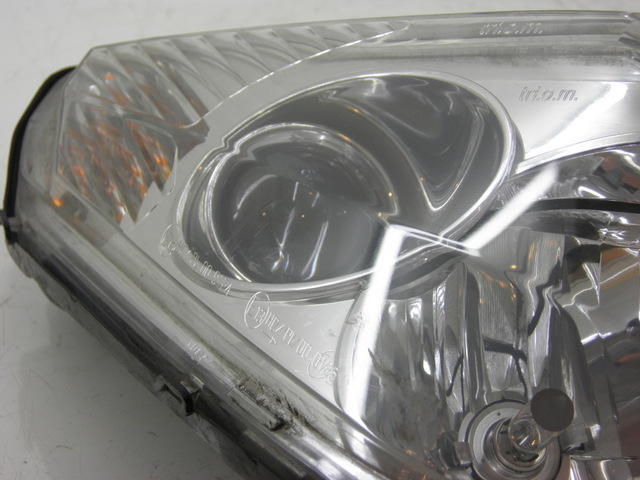 photo de PHARE AVANT DROIT PEUGEOT SATELIS 125 (2006 - 2009)