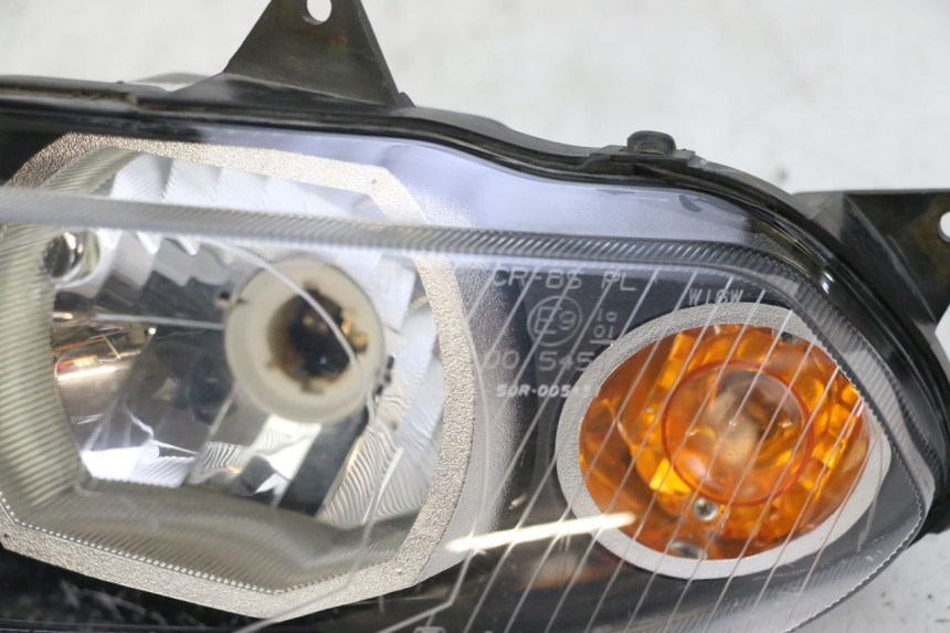 photo de PHARE AVANT GAUCHE YAMAHA TZR 50 (2008 - 2016)