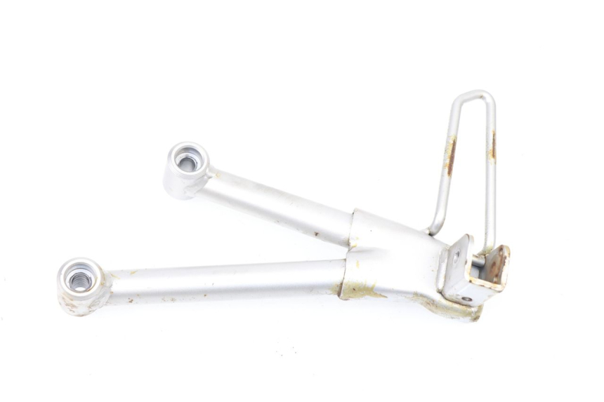 photo de PLATINE CALE PIED ARRIERE GAUCHE SUZUKI GSF S BANDIT 600 (2000 - 2004)