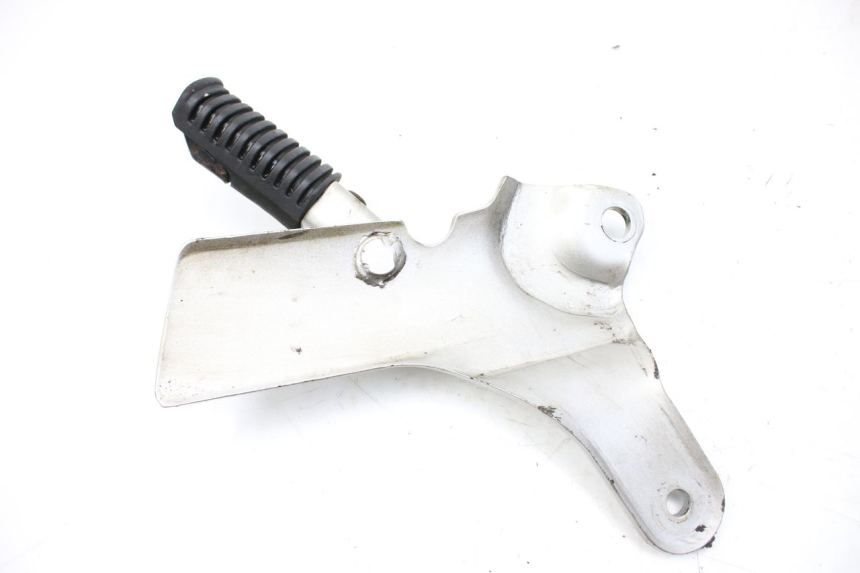photo de PLATINE CALE PIED ARRIERE GAUCHE SYM HUSKY 125 (1999 - 2005)