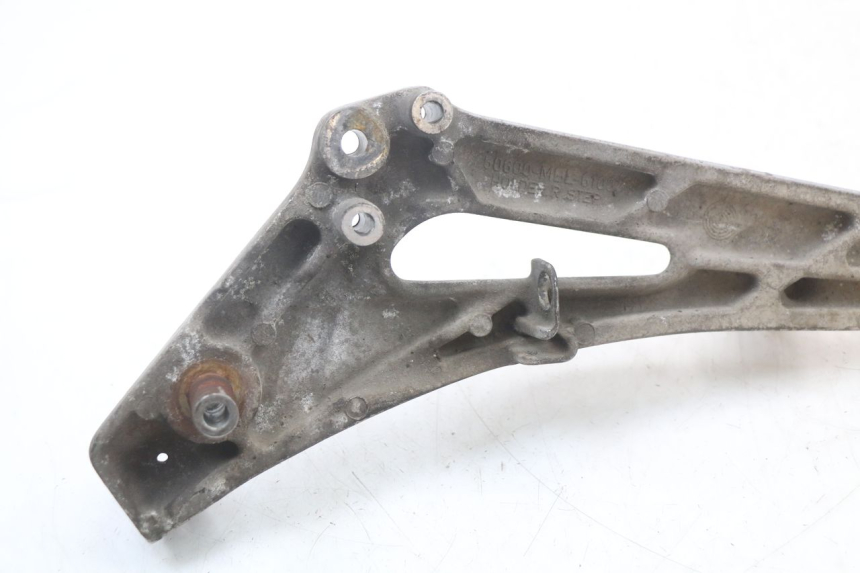 photo de PLATINE CALE PIED AVANT DROIT HONDA NTV DEAUVILLE 650 (1998 - 2001)